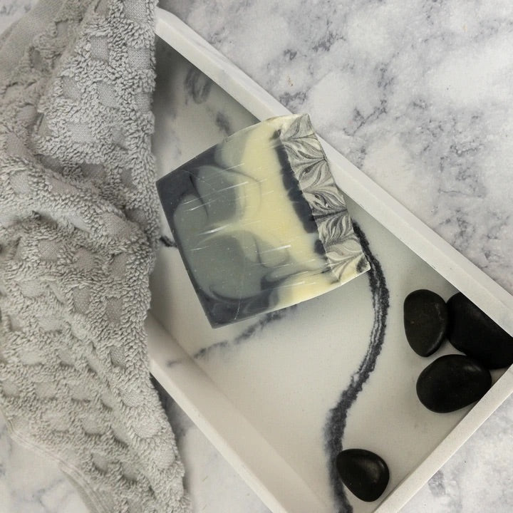 Inspired by the colors found in canyons; this soap is as nourishing for your skin as a trip to the canyon is for your soul...complete with a dusting of red that no trip to the canyon is complete without! Scented with a blend of dandelion, wildflowers, aloe vera, and musk; with a hint of pear. Ingredients: olive oil, palm oil, coconut oil, sodium hydroxide, sunflower oil, shea butter, castor oil, fragrance, mica